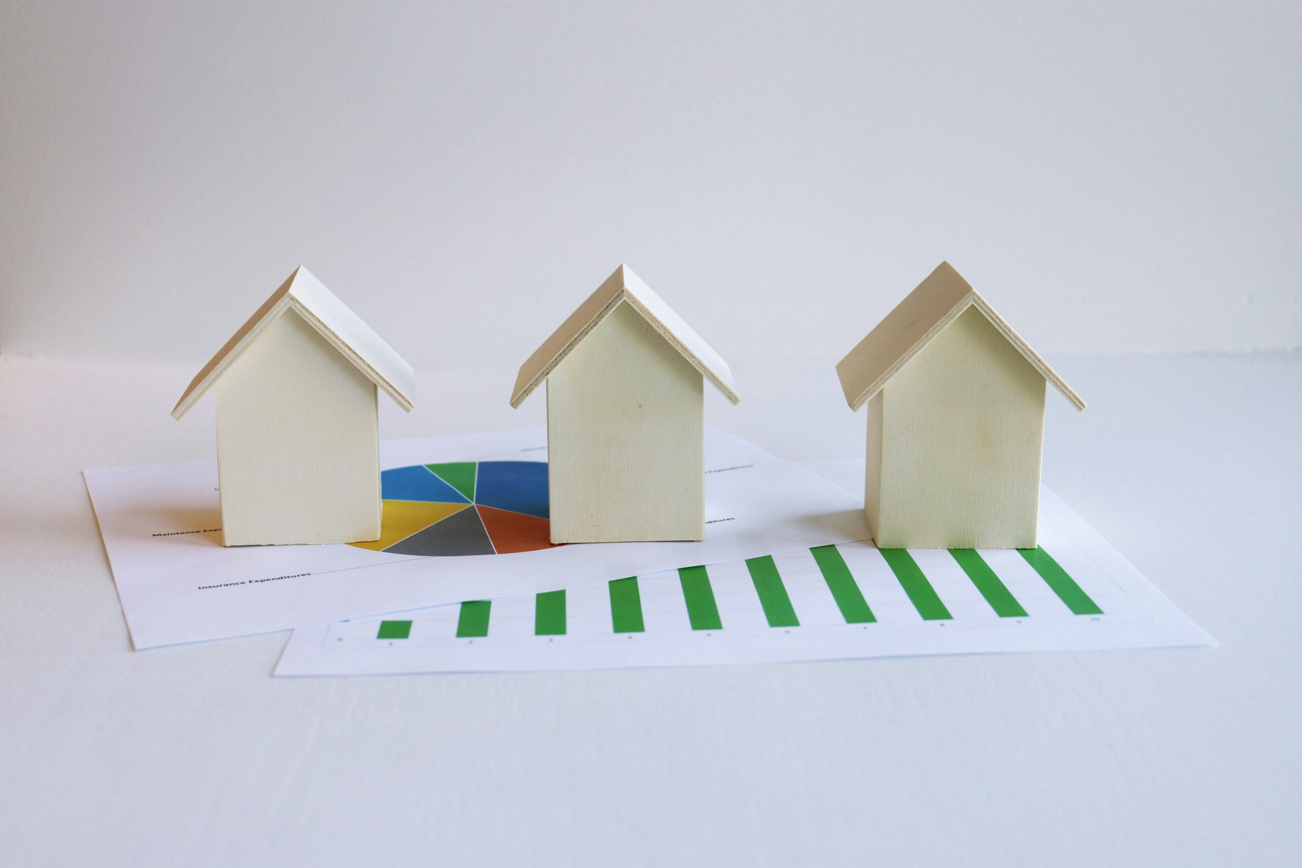 Landlord reviewing buy-to-let property figures, rental yield and mortgage costs before investing